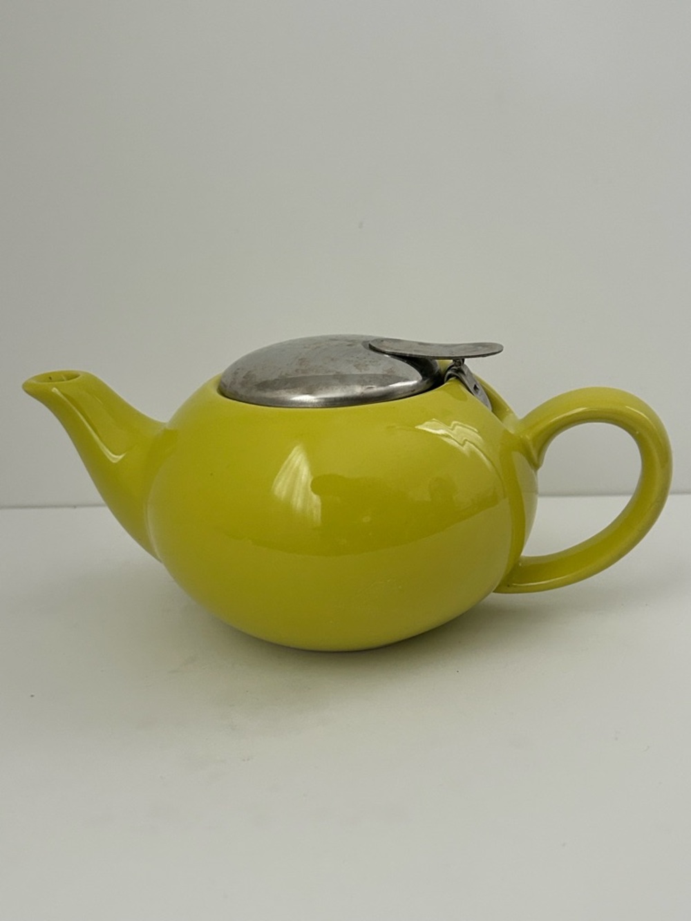 Certified International Bright Yellow Ceramic Teapot with Stainless Lid